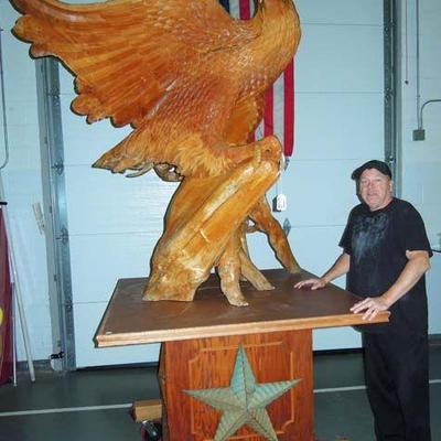 MONUMENTAL HAND CARVED TEAK SCULPTURE OF EAGLE WITH OUTSTRETCHED WINGS