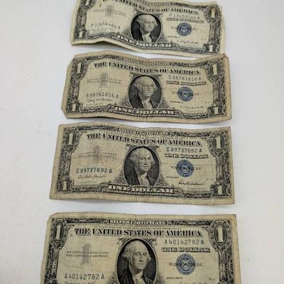 Four 1957 $1 Silver Certificates