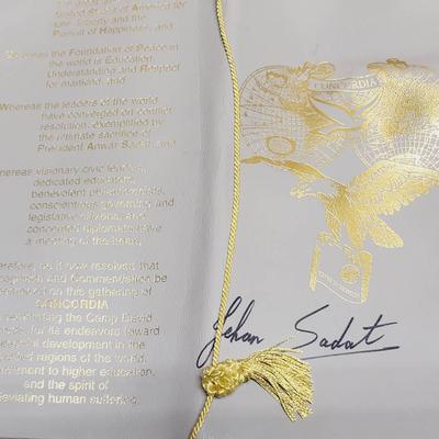 Signed Leather Bound Dinner Program with Jehan Sadat Autograph 