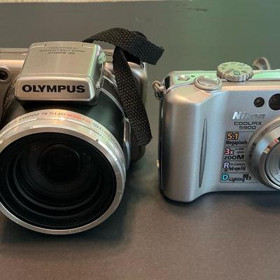 Two Digital Cameras - Olympus & Nikon 