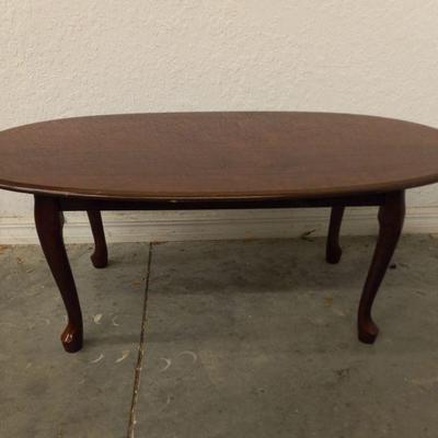 Medium Wood Oval Coffee Table with Styled Cabriolet Legs - 41½" x 21¼" x 15½"