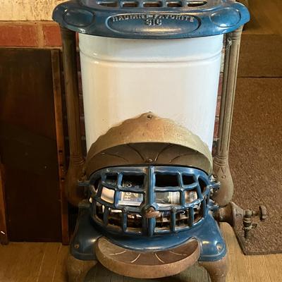 Antique Cast Iron Parlor Stove by The Favorite Stove & Range Co. of Piqua, OH