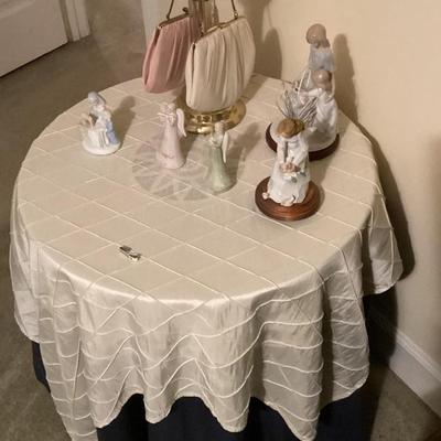 Round table with various figurines