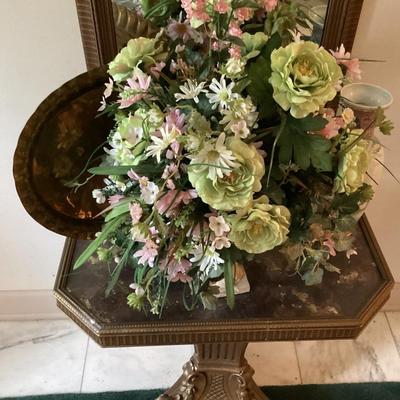 Floral arrangement in container