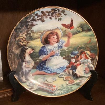 Decorative plate girl with bird and dog