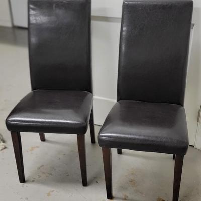 Two Upholstered Leatherette Chairs