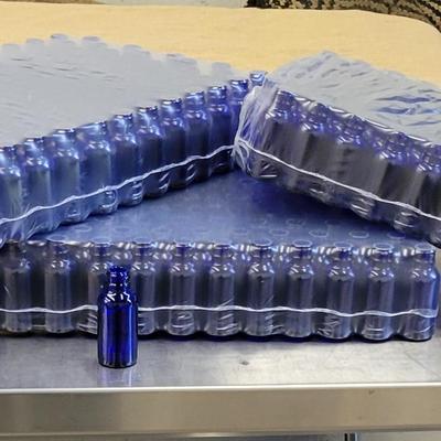1 oz Blue Glass Bottles - over 300 count