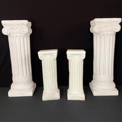 Assorted Sizes Of White Decorative Columns 