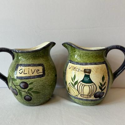 Delta Downs Painted Ceramic Pitcher Pair
