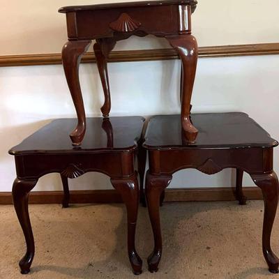 A Set Of Three Dark Wood Side Tables