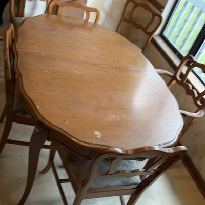 Table With Six Upholstered Chairs And A Leaf