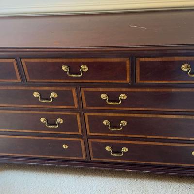 Nine Drawer Wooden Dresser By Thomasville 