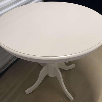 White Pedestal Table