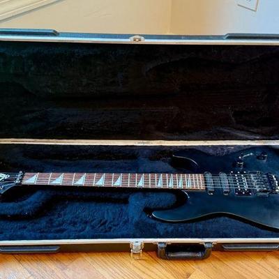 Jackson Soloist electric guitar in case 