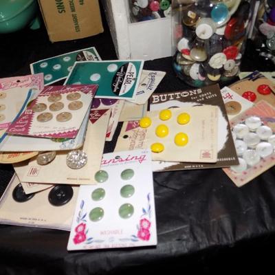 Vintage buttons on cards and many loose vintage button in jars