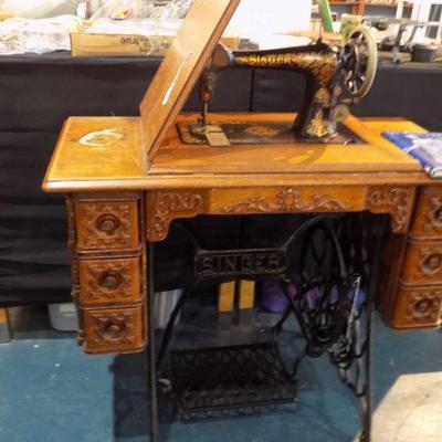 Antique Singer sewing machine and cabinet