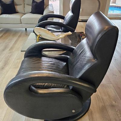Pair Of Odyssey Black Leather Recliners Designed By Rick Lee.