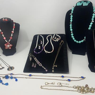 Pink, Aquamarine, and Blue Costume Necklaces and Earrings.