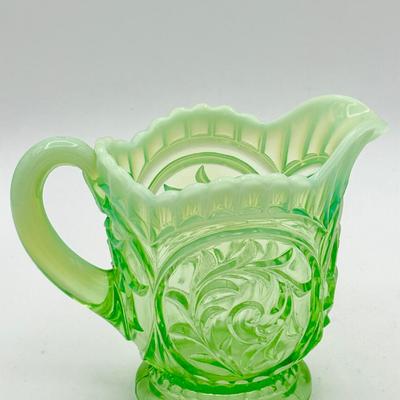Uranium Glass Creamer – Scroll & Shell Pattern with Opalescent Rim