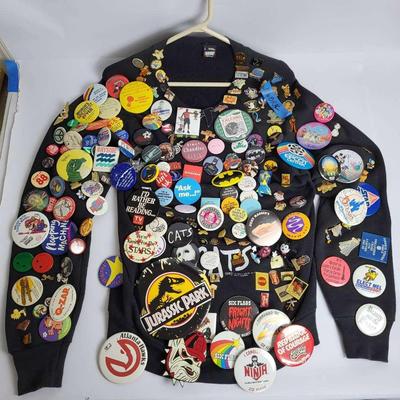 Sweatshirt with Assorted Pins and Buttons - Cartoon, Political, Advertising, & Iconic Logos