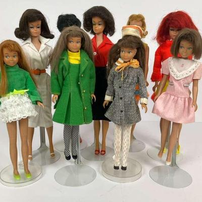 Collection of Barbie Dolls in Fashionable Outfits