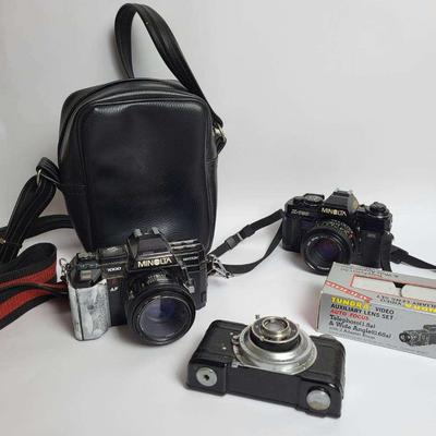Vintage Camera Collection Including Minolta 7000 Maximum, Minolta X-700, and More