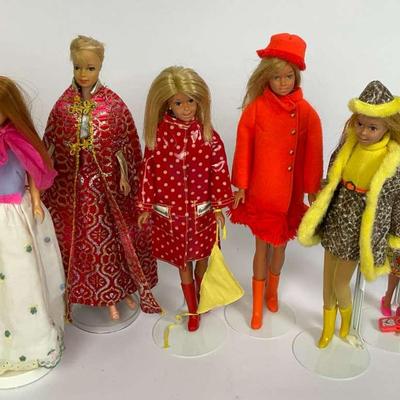 Vintage Barbie Clone Dolls in Bold Prints and Classic Coats