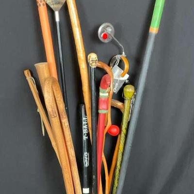 Collection of 16 Canes and Walking Sticks with Galvanized Holder