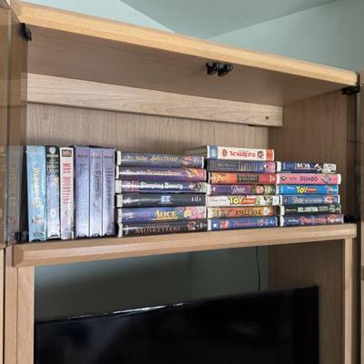 Disney vhs tapes, tv wall unit