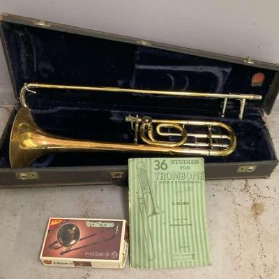 Conn Trombone with Case and Music Book