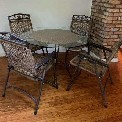 Glass-Top Bistro Table with Four Folding Wicker Chairs