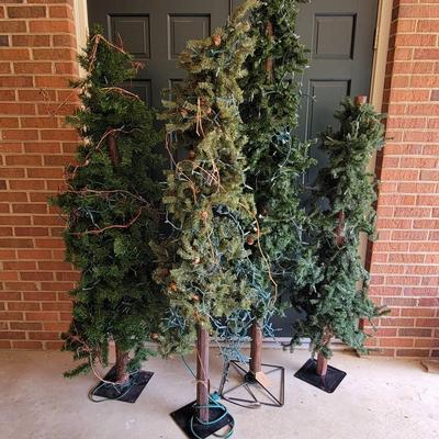 (4) Lighted Christmas Trees