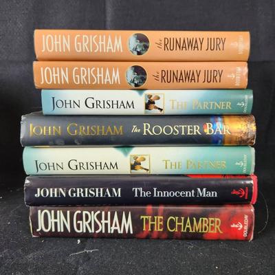 (7) John Grisham Hardback Books