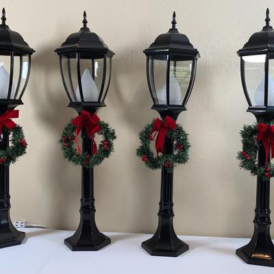 Four battery operated lanterns