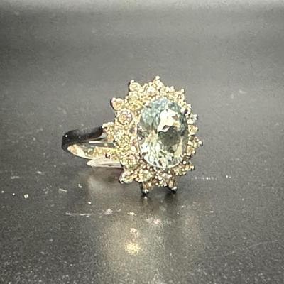Aquamarine and diamonds on 14k gold setting