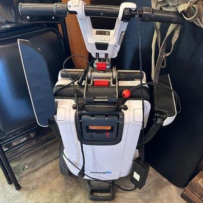 Electric travel wheelchair