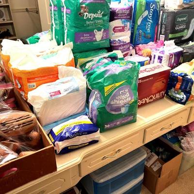 Large assortment of grown-up diapers