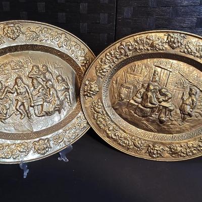 Oval Metal Wall Hangings Depicting Tavern Scenes 
