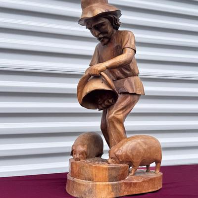 12” Hand-Carved Wood Sculpture – Farmer Feeding Pigs
