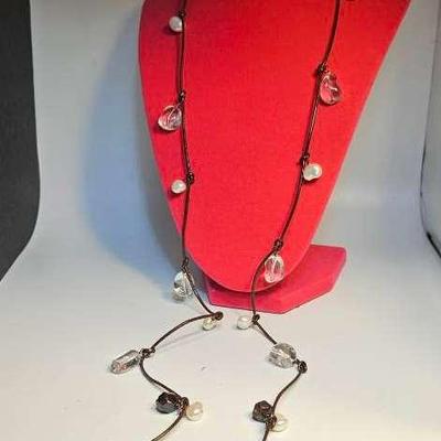 Brown Beads On A Brown Lariat With Faux Pearls And Clear Beads