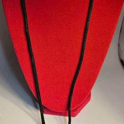 Vintage Clossionne Pendant On A Black Rope Neckace