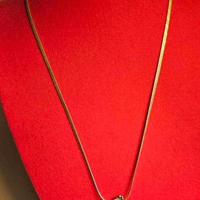 Sterling Silver Chain Necklace With A Light Green Jade Elephant 