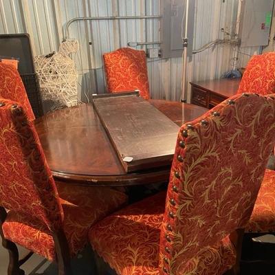 Round dining table with leaf and six chairs