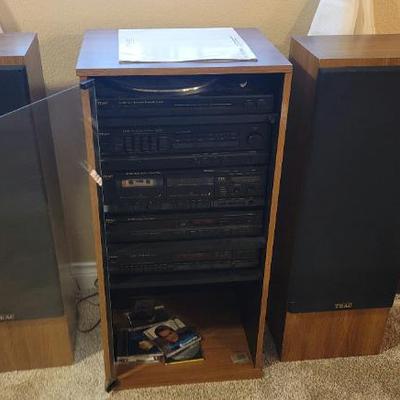 TEAC stereo system in cabinet 