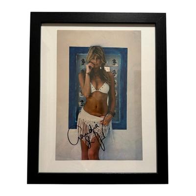 Sale Photo Thumbnail #407: Signed photo of Claudia Schiffer in frame 16" x 12.5" 