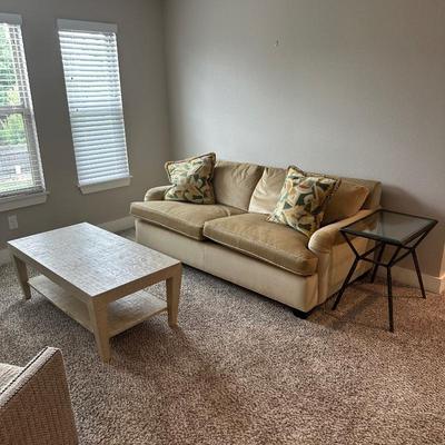 Sale Photo Thumbnail #580: Avery Boardman sleeper sofa, Serena and Lily Blake raffia coffee table and French Iron glass top table with beveled glass