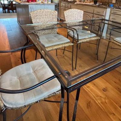 Sf100 glass topped table and rattan chairs