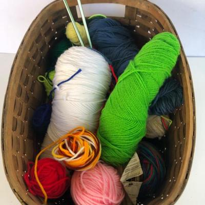Basket of Yarn and Knitting Needles