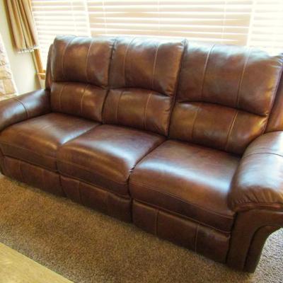 Leather power reclining sofas