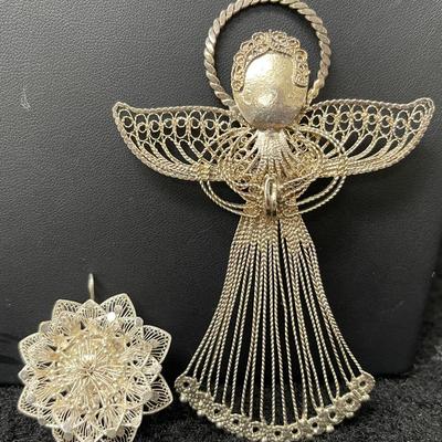 Two Unmarked Silver Pendants